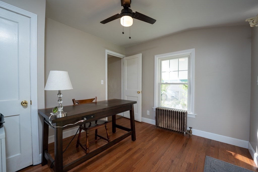 44 Hillside Avenue West Springfield, MA 01089 - Photo 7 of 34 a view of a workspace with furniture and a window