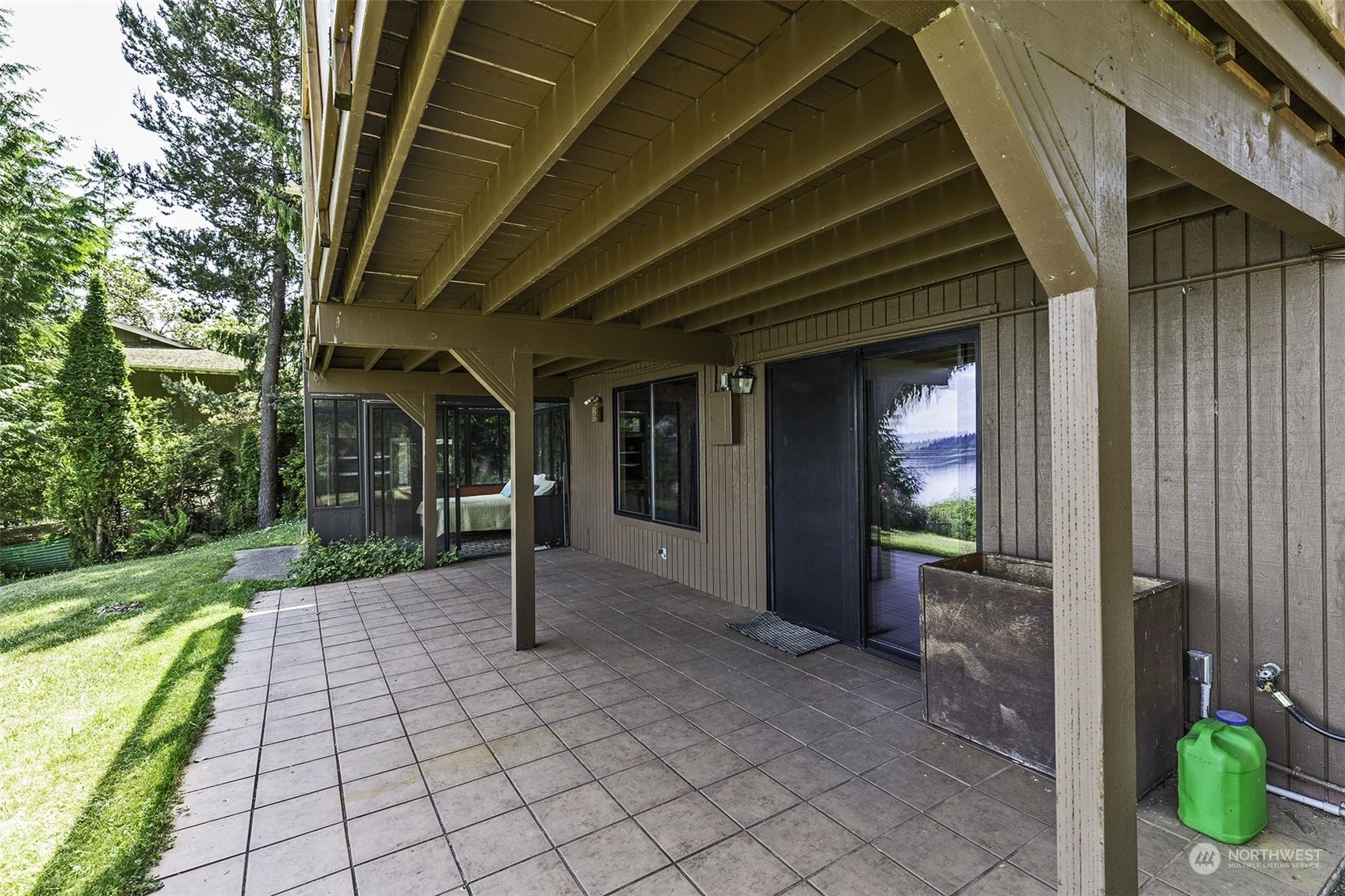 14125 Lyle Point Road Anderson Island, WA 98303 - Photo 28 of 38 a view of a porch with furniture