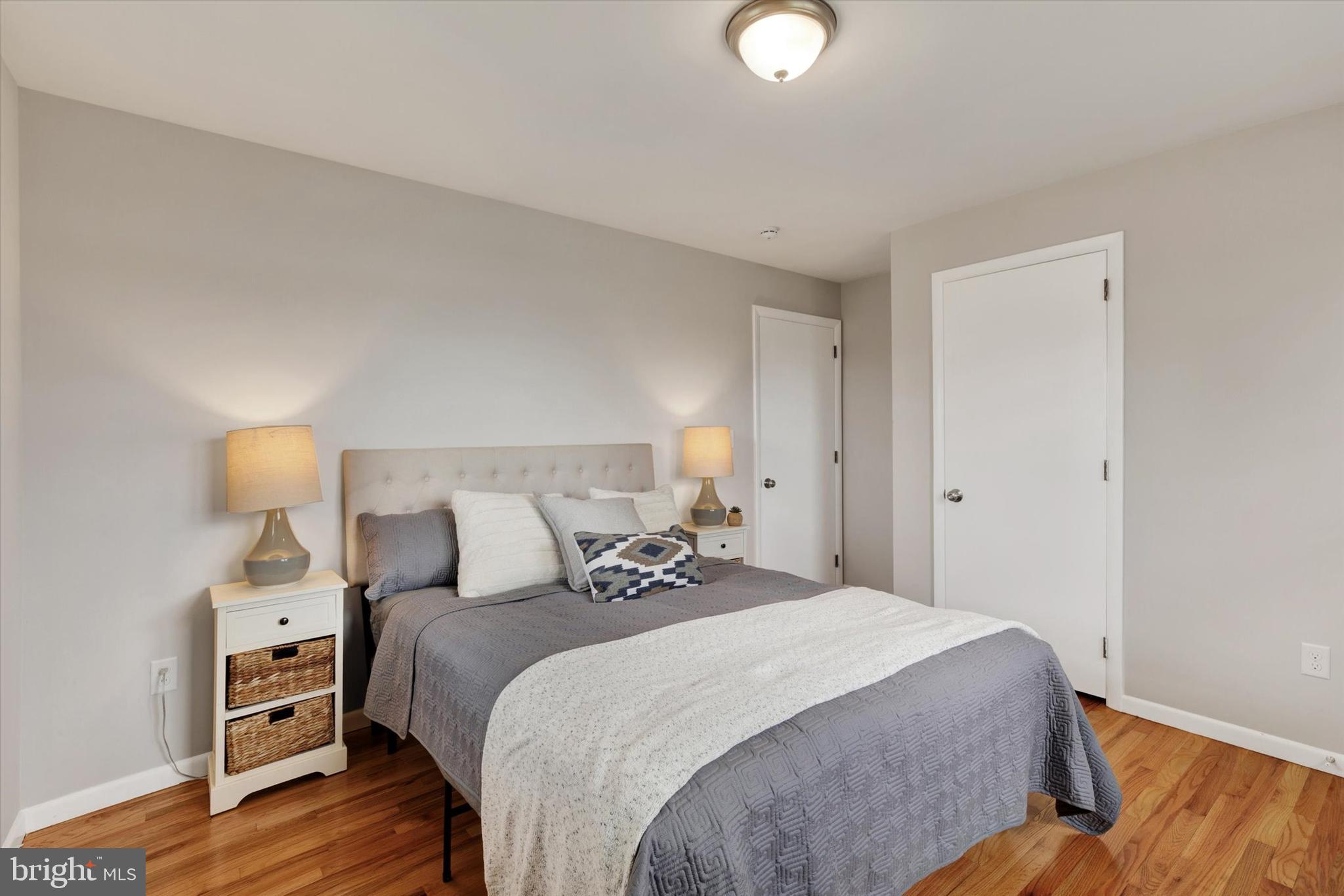 1227 Lebanon Road Manheim, PA 17545 - Photo 13 of 31 a bedroom with a bed and a lamp