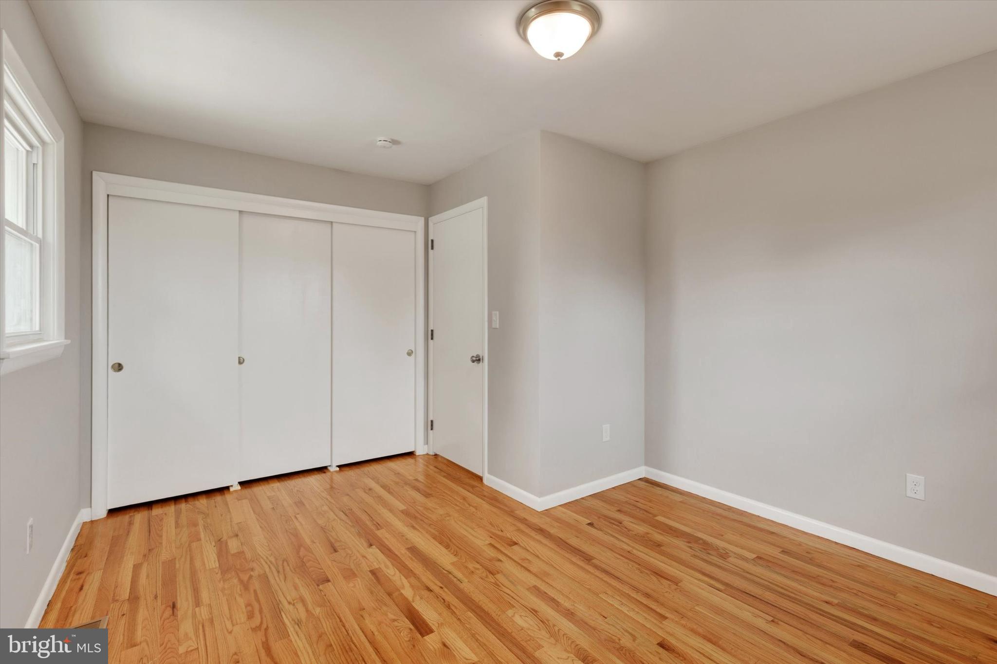 1227 Lebanon Road Manheim, PA 17545 - Photo 15 of 31 a view of empty room with wooden floor