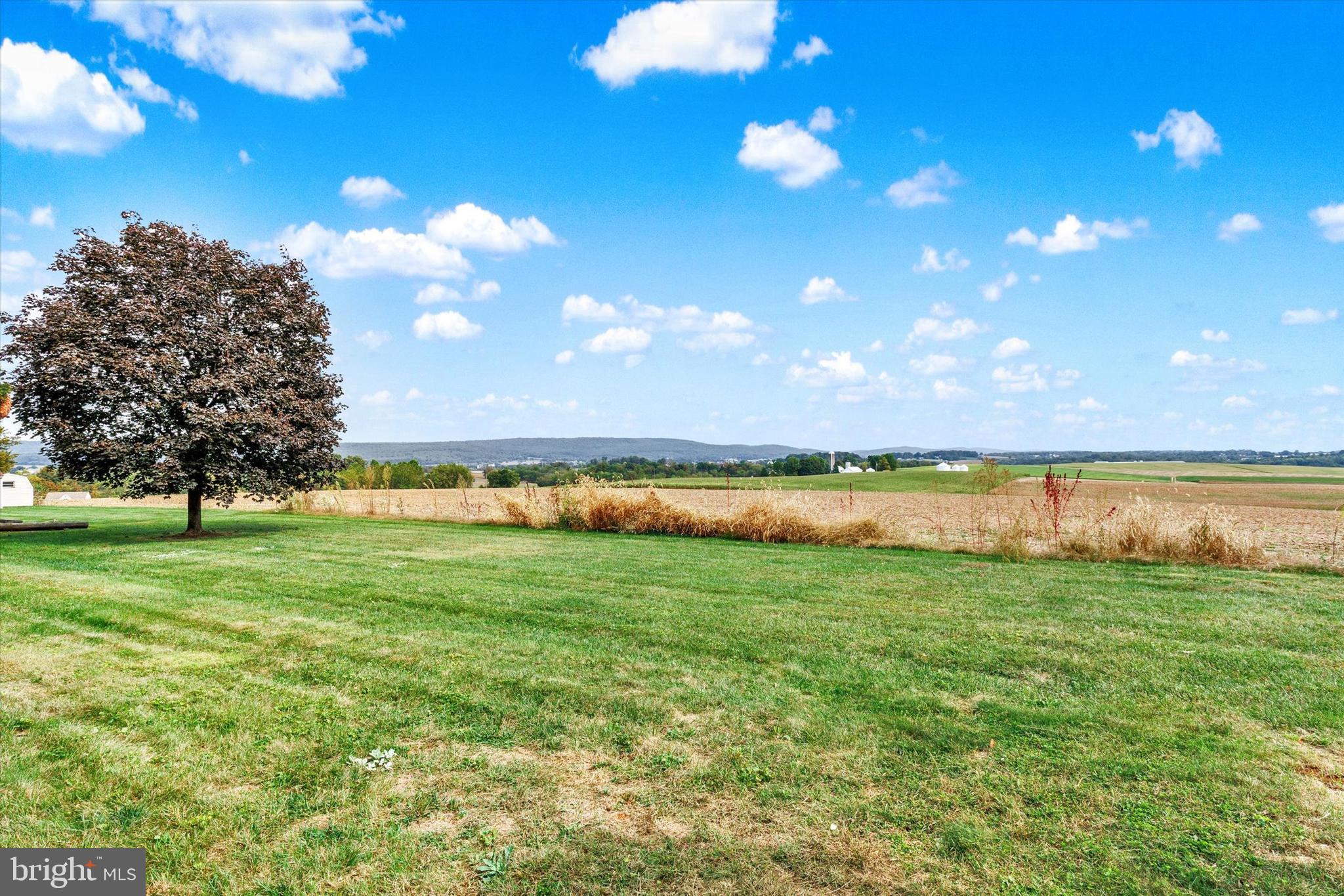 1227 Lebanon Road Manheim, PA 17545 - Photo 26 of 31 a view of a lake and sunset