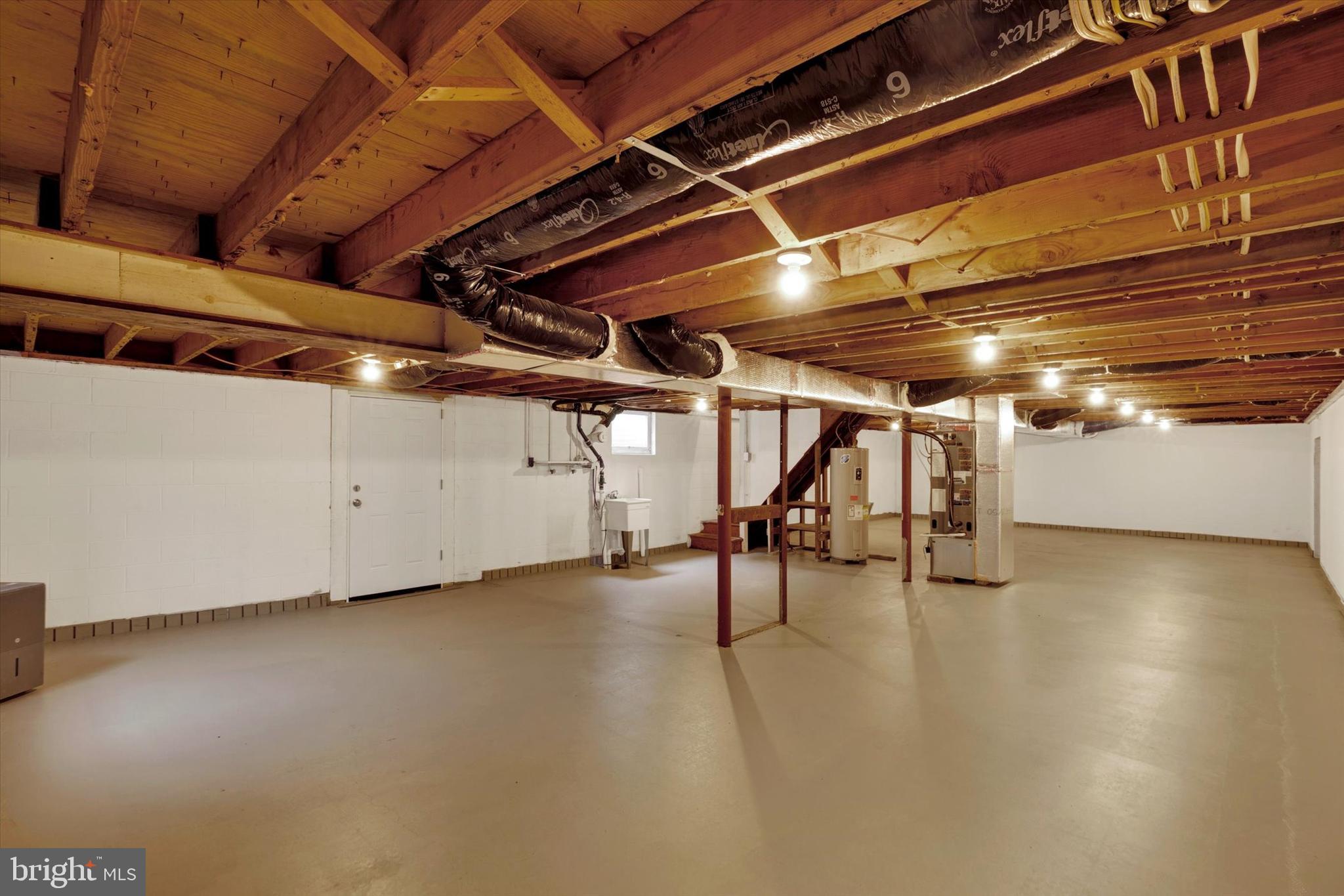 1227 Lebanon Road Manheim, PA 17545 - Photo 29 of 31 a view of water heater room with wooden ceiling