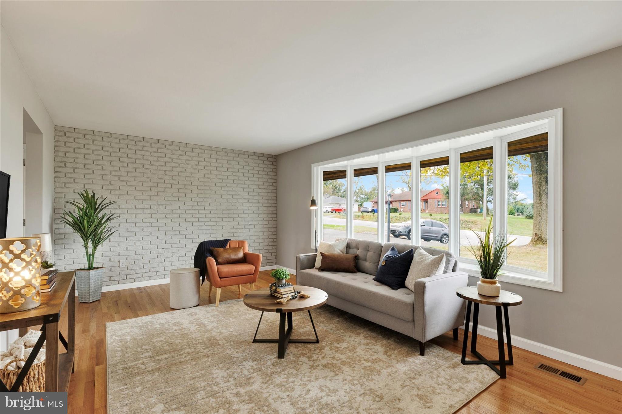 1227 Lebanon Road Manheim, PA 17545 - Photo 8 of 31 a living room with furniture and a large window