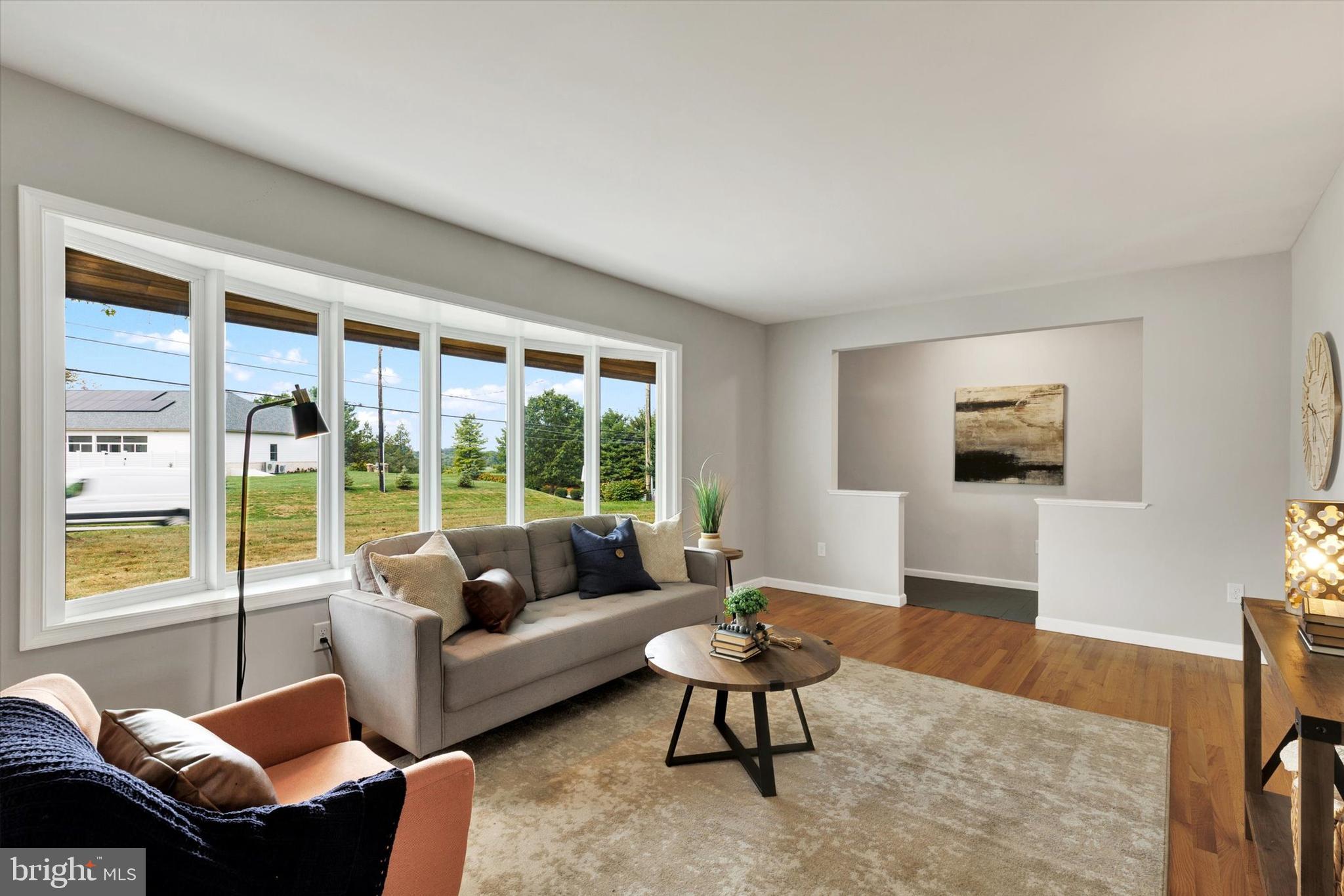 1227 Lebanon Road Manheim, PA 17545 - Photo 9 of 31 a living room with furniture and a large window