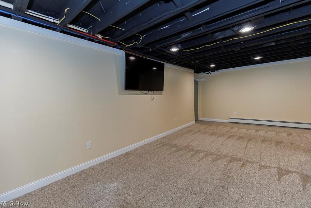 32618 Detroit Road Avon, OH 44011 - Photo 34 of 40 Finished room featuring wall-to-wall carpeting, light-toned walls, and recessed lighting