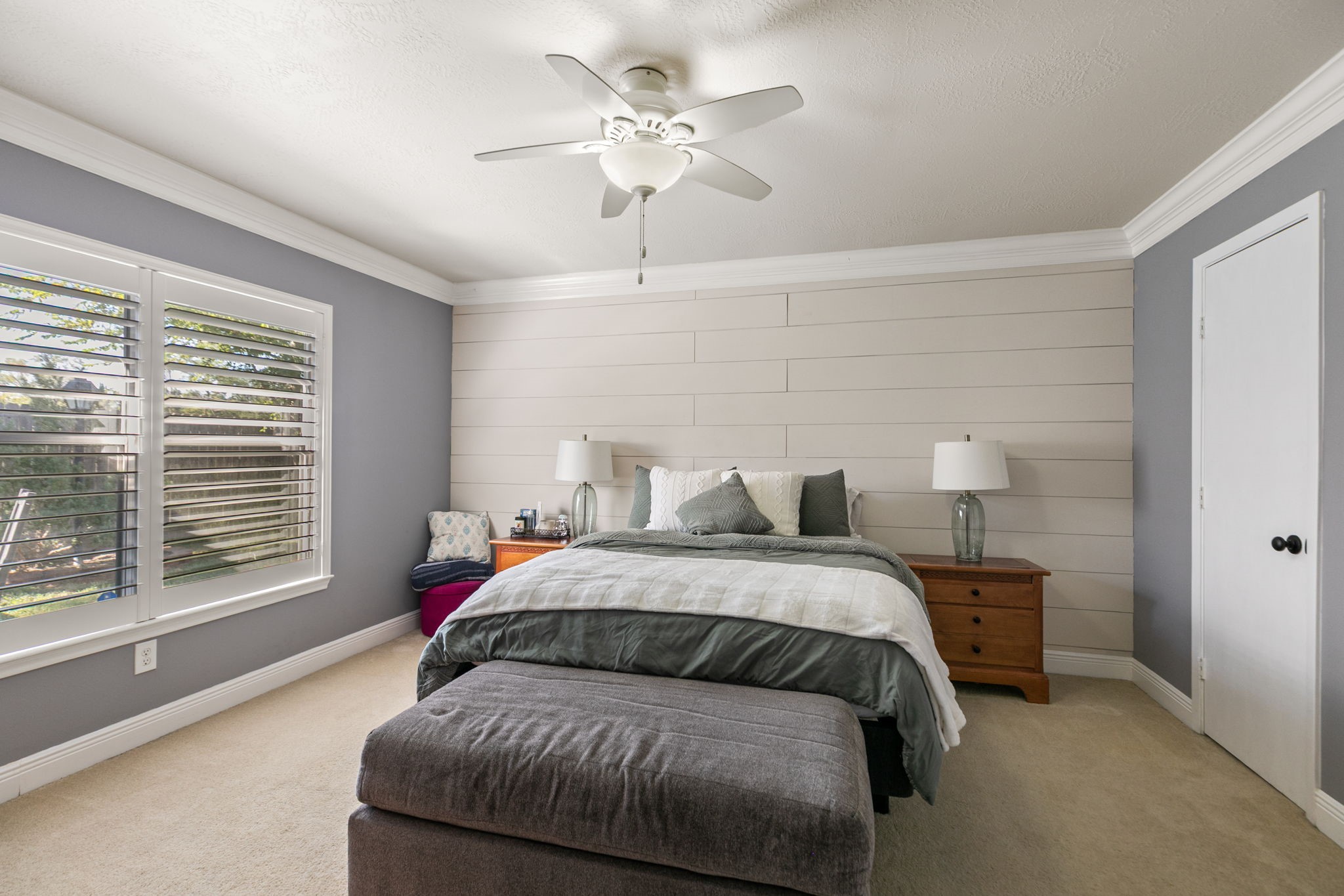 3714 Colleen Woods Circle Houston, TX 77080 - Photo 19 of 29 a bedroom with a bed and a chandelier