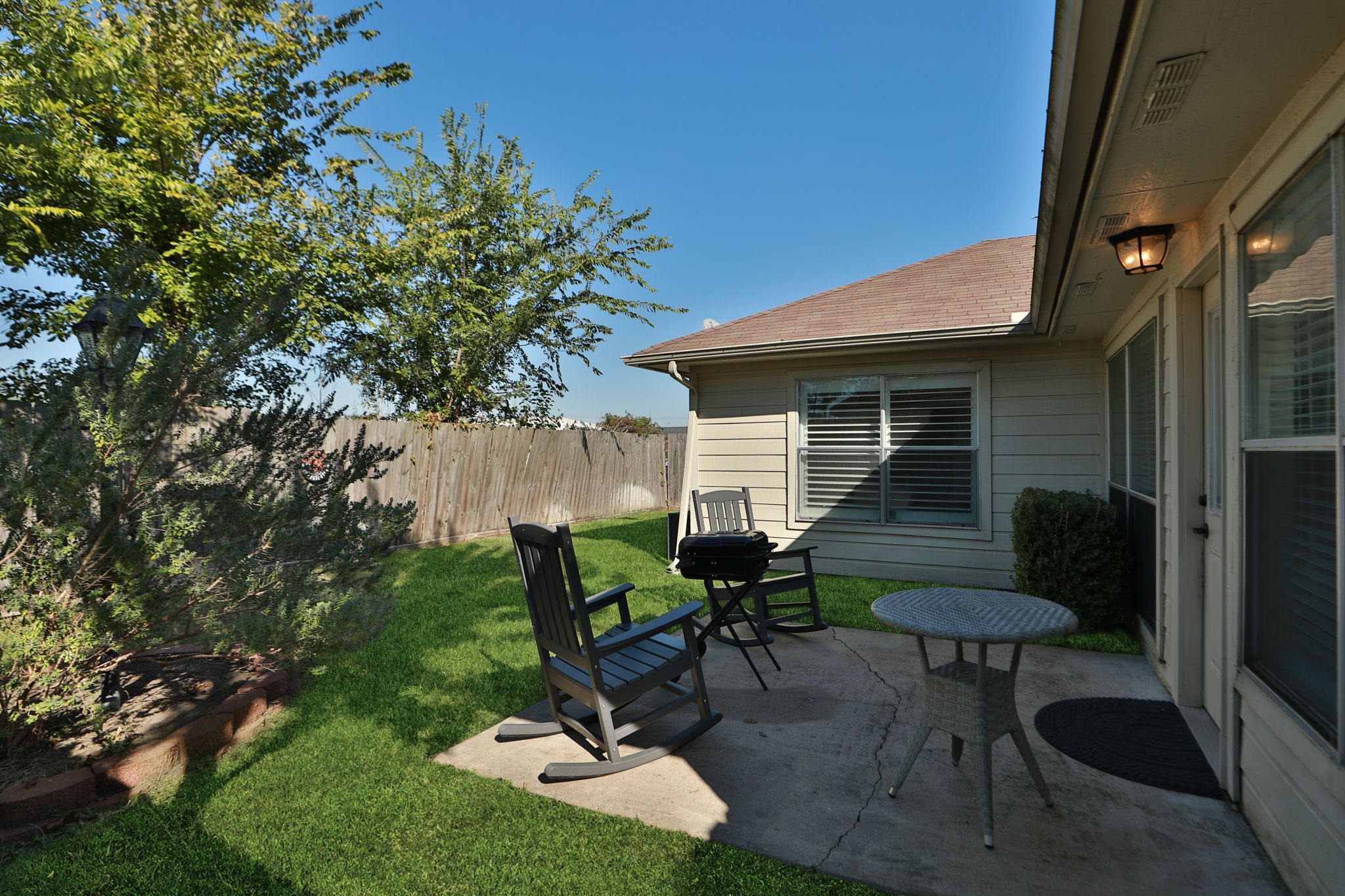3714 Colleen Woods Circle Houston, TX 77080 - Photo 26 of 29 a view of backyard with seating space and wooden fence