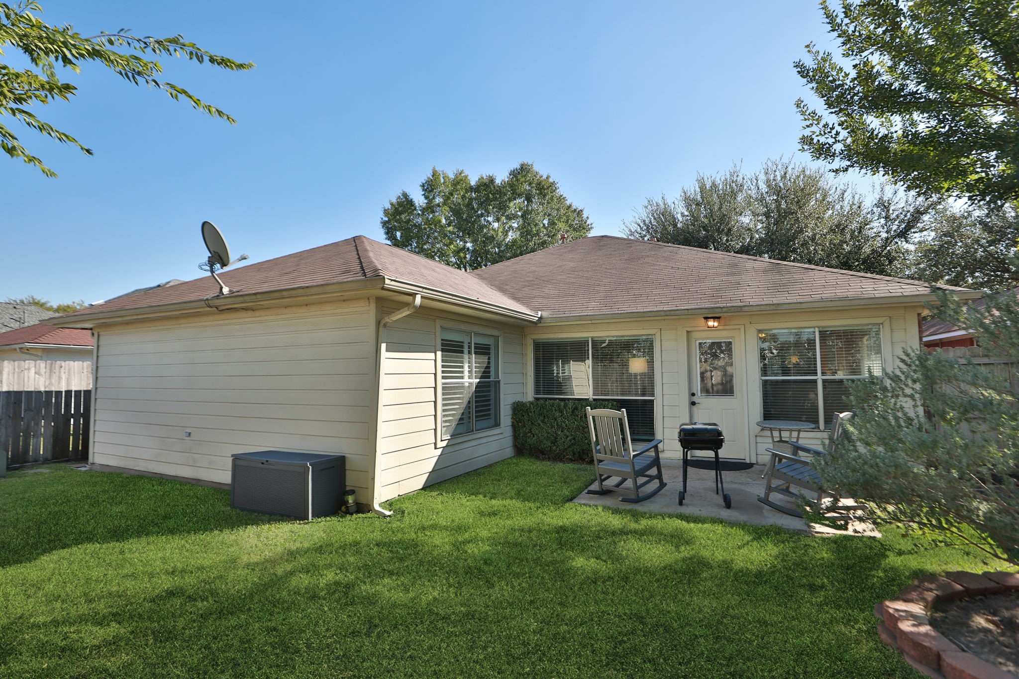 3714 Colleen Woods Circle Houston, TX 77080 - Photo 27 of 29 a view of a house with a yard and sitting area