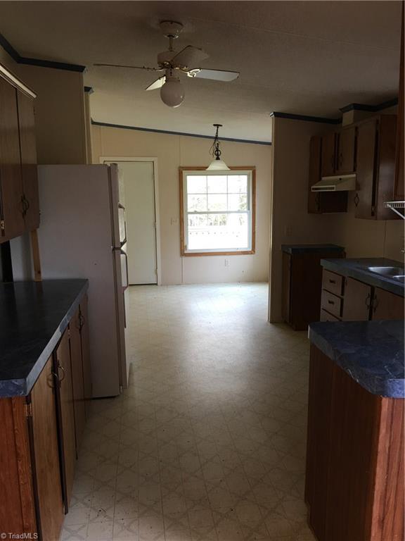 Kitchen looking into Breakfast area