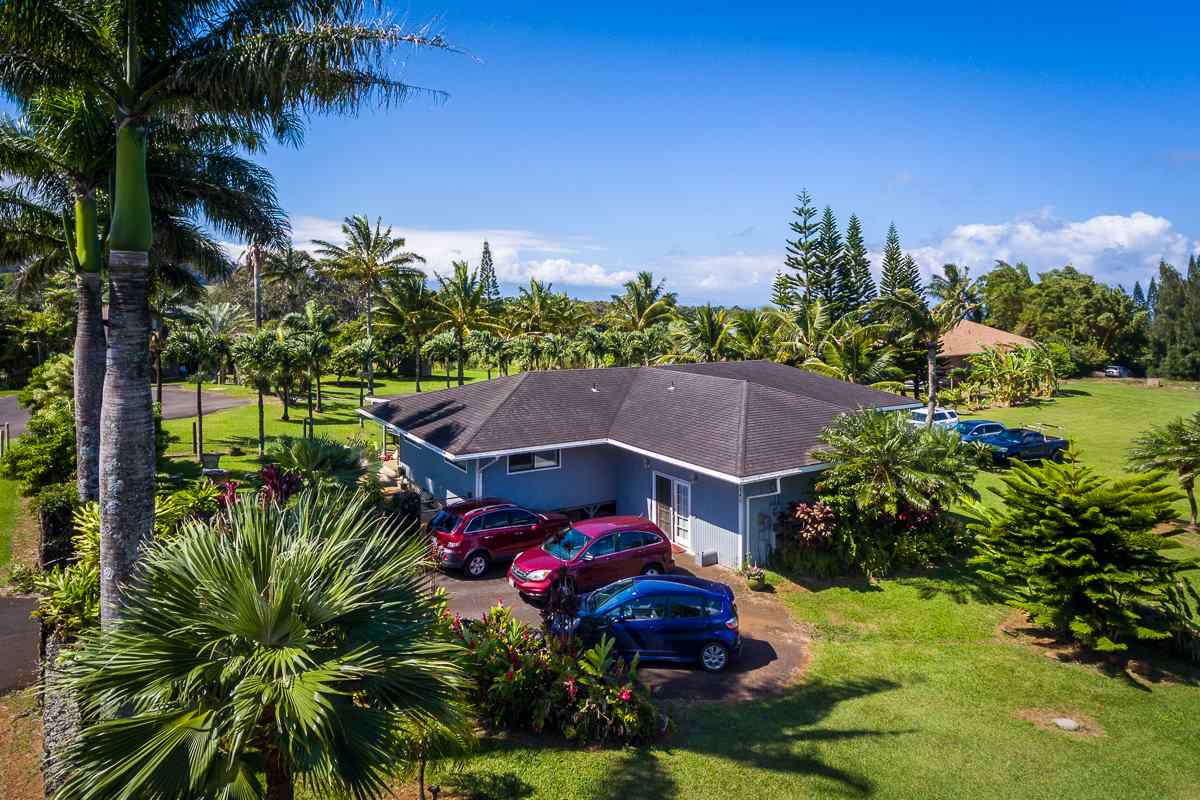 1320 West Kuiaha Road Haiku, HI 96708 - Photo 2 of 29 a aerial view of a house with yard and swimming pool