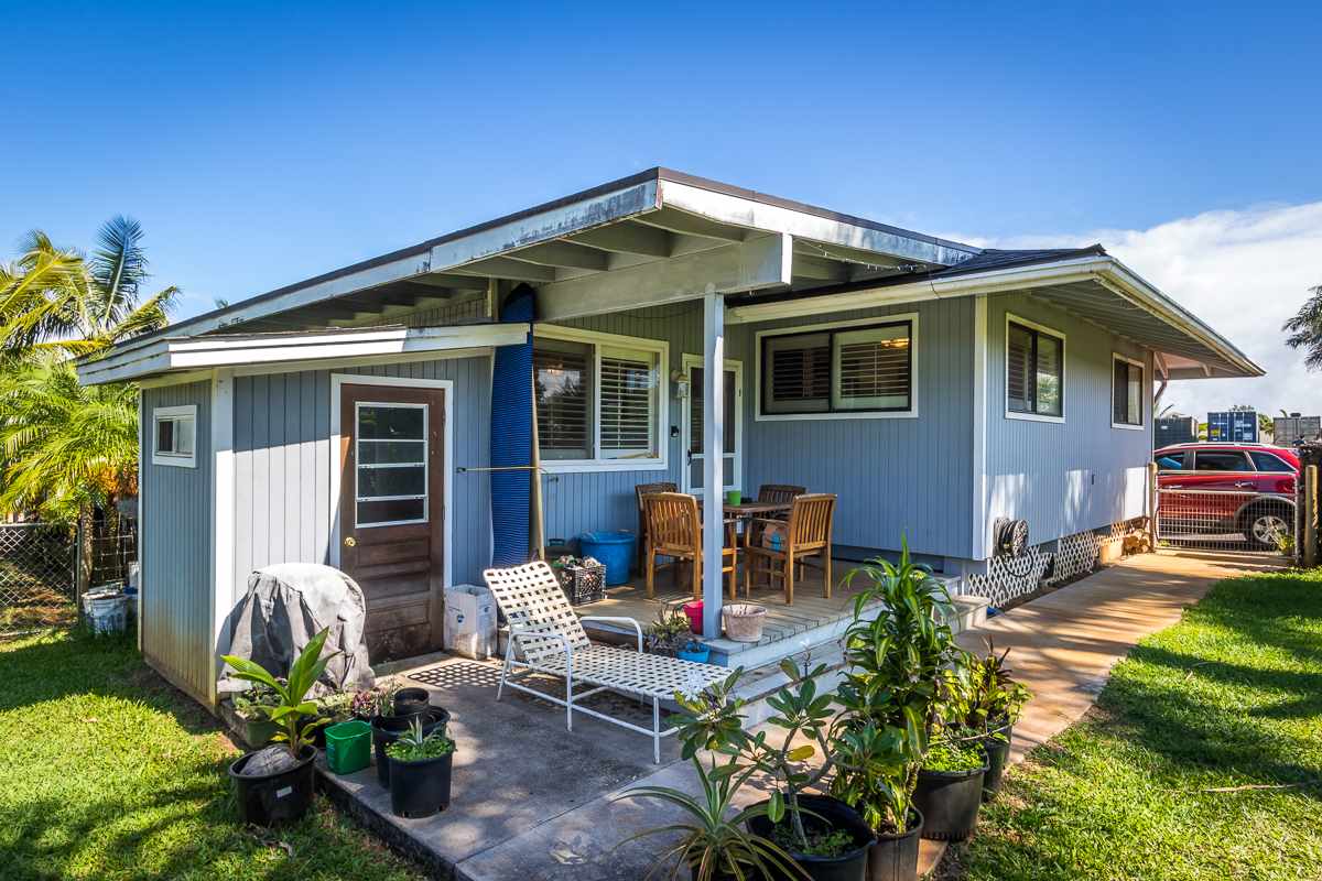 1320 West Kuiaha Road Haiku, HI 96708 - Photo 3 of 29 a front view of a house with garden