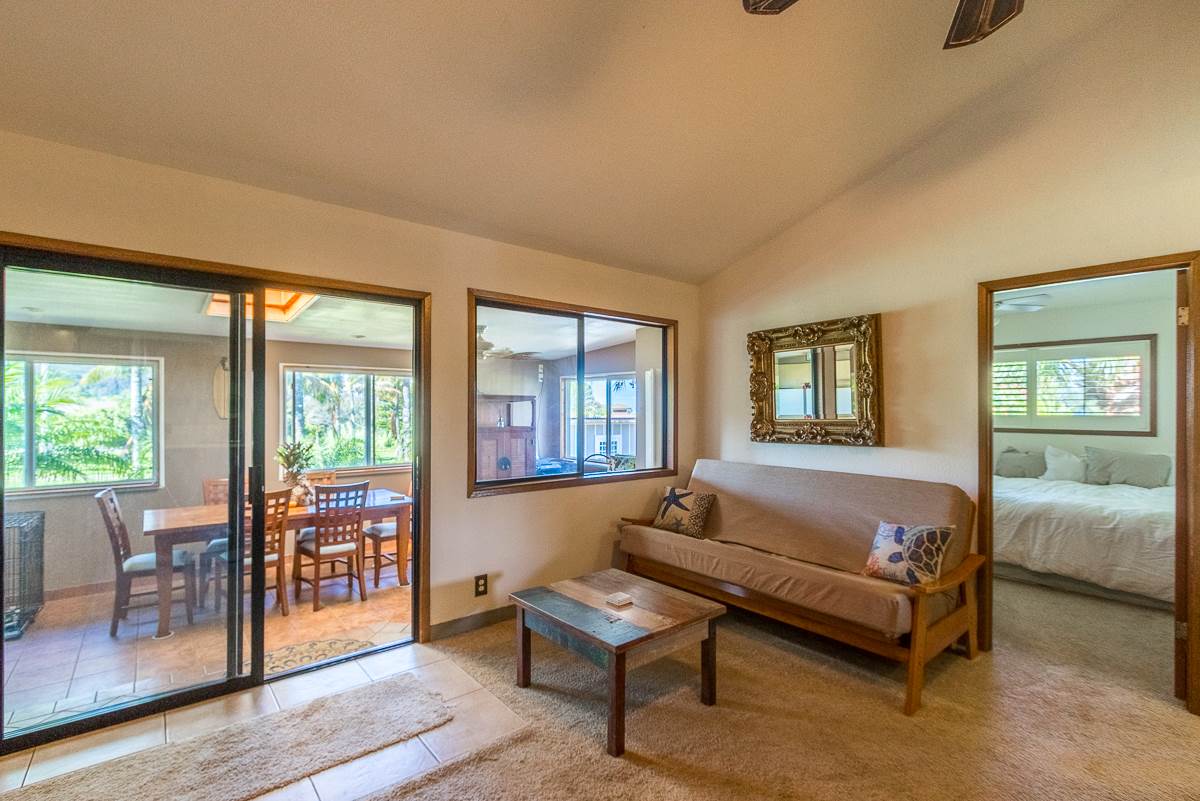 1320 West Kuiaha Road Haiku, HI 96708 - Photo 8 of 29 a living room with furniture and a window