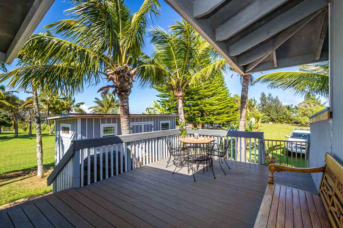 1320 West Kuiaha Road Haiku, HI 96708 - Photo 10 of 29 a view of a chairs and table on the wooden deck