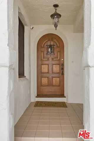 a view of entryway with a front door