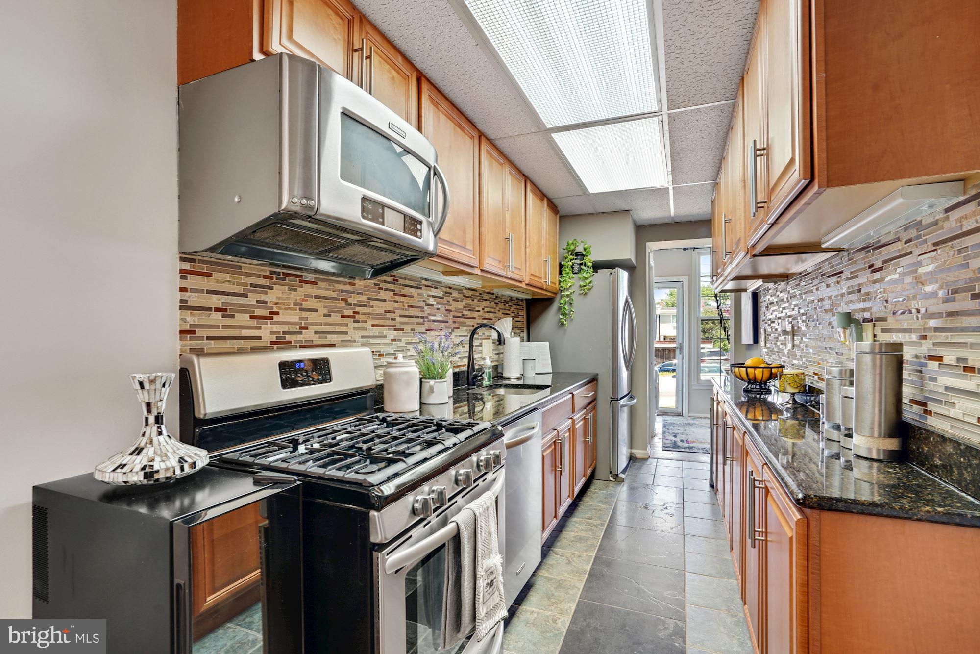 941 Randolph Street Northwest, Unit B Washington, DC 20011 - Photo 9 of 26 Kitchen with stainless steel appliances
