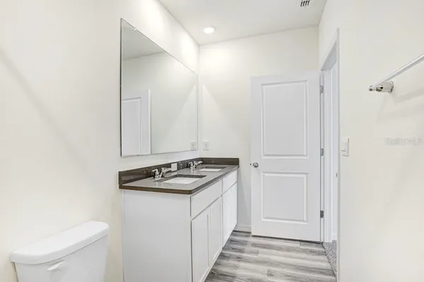 a kitchen with a sink and a stove