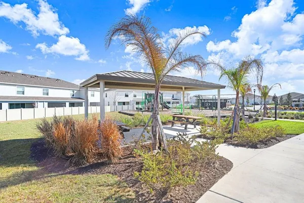 a view of a swimming pool with a patio