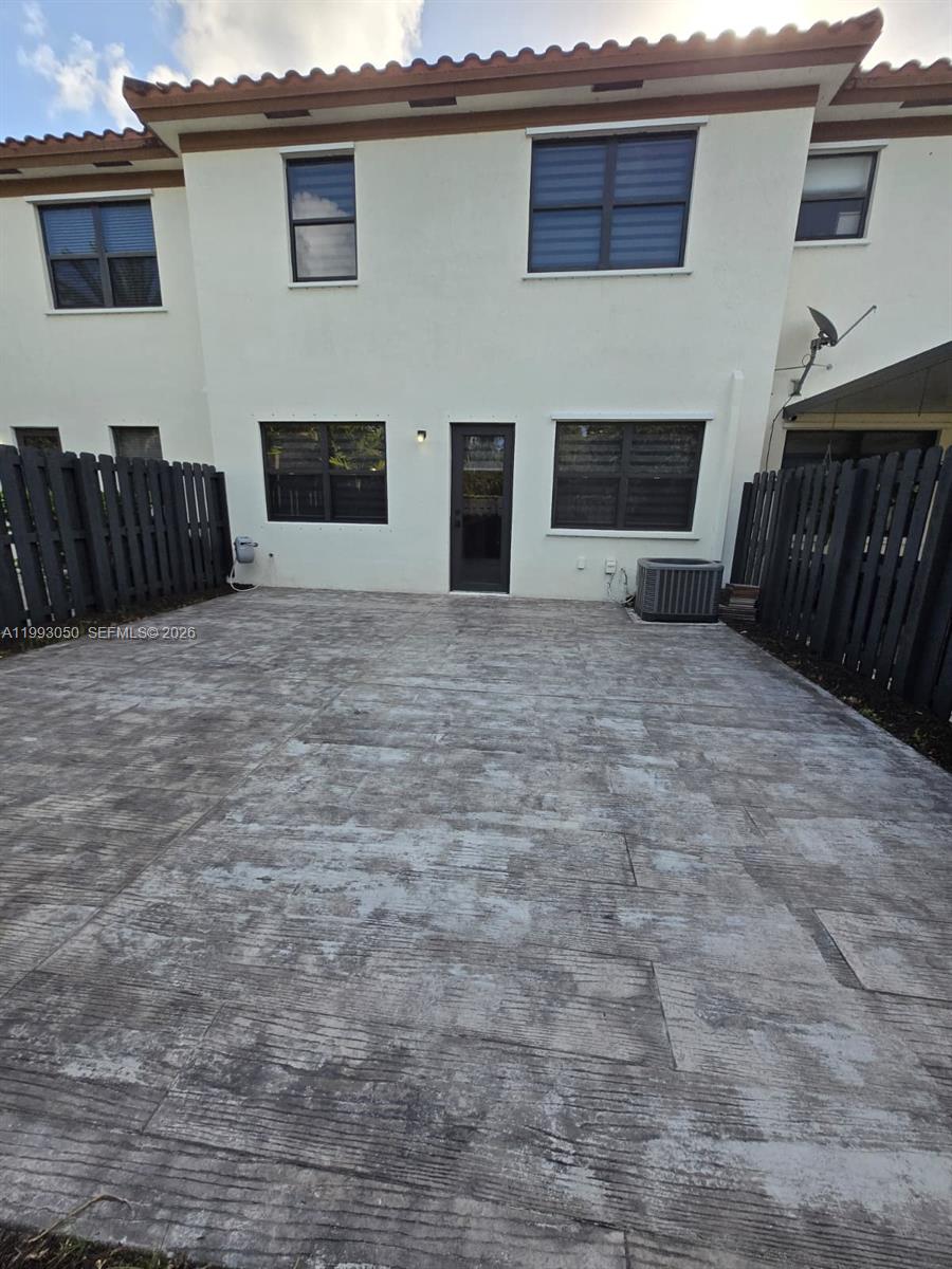 4268 Southwest 166th Court, Unit 4268 Miami, FL 33185 - Photo 20 of 21 a view of a house with wooden floor and a fireplace