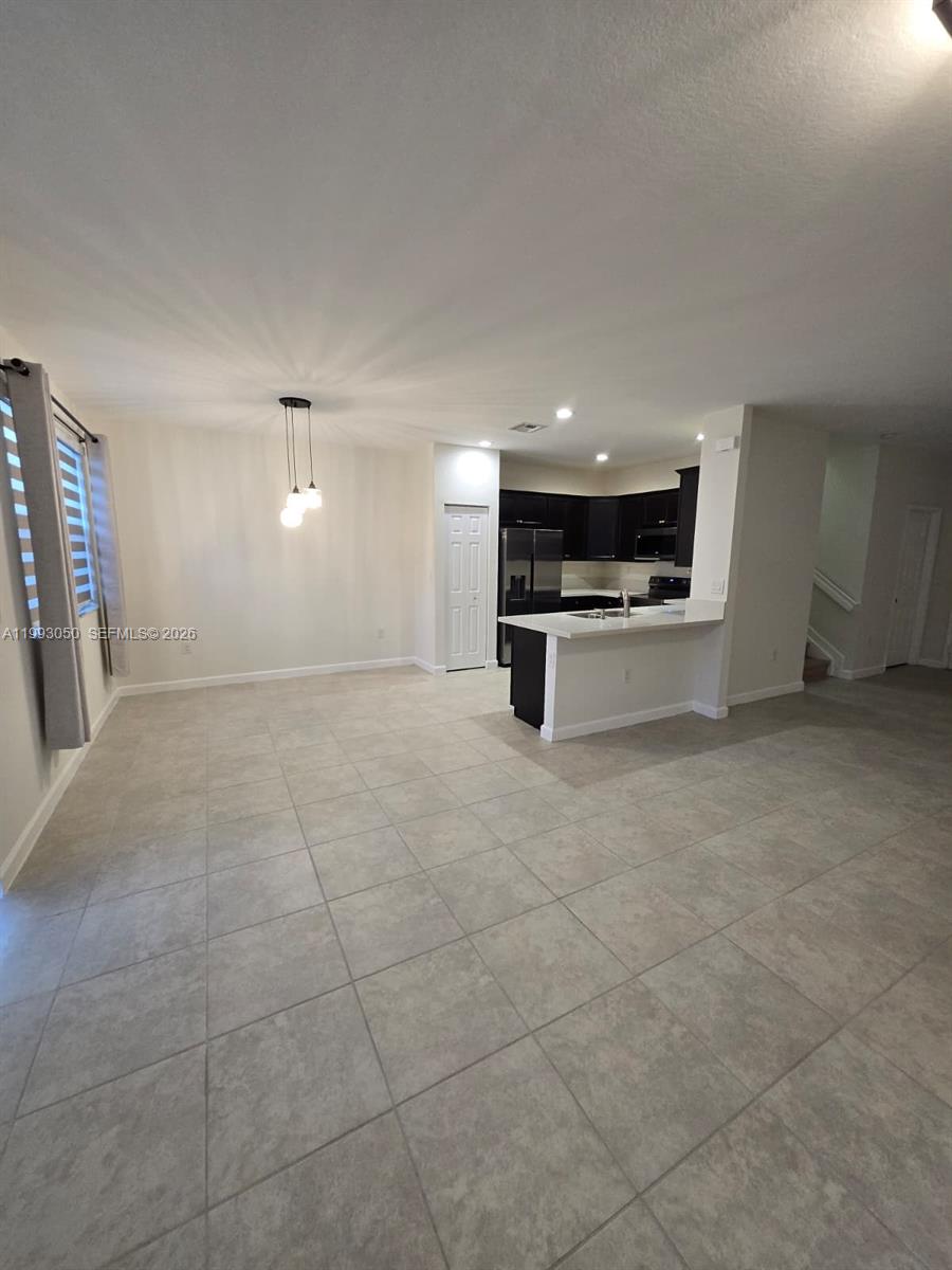 4268 Southwest 166th Court, Unit 4268 Miami, FL 33185 - Photo 3 of 21 a view of a electric appliances in a room