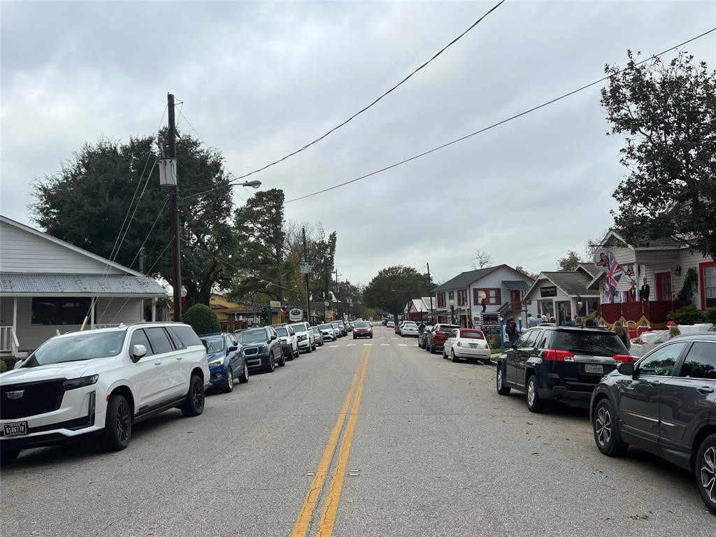 26218 Aldine Westfield Road Spring, TX 77373 - Photo 11 of 14 a view of a cars park in front of a house