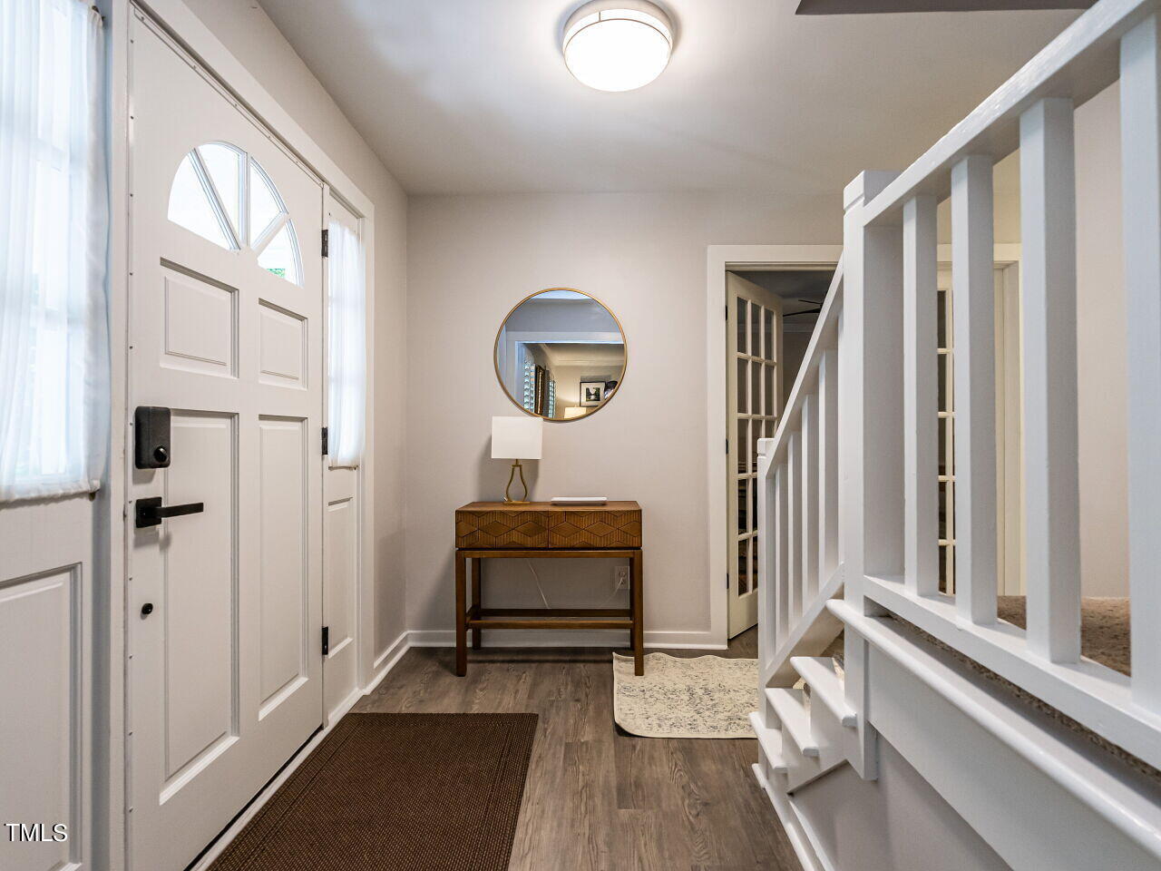 8313 North Creek Run Raleigh, NC 27613 - Photo 6 of 44 Freshly Painted Foyer with New LVP.