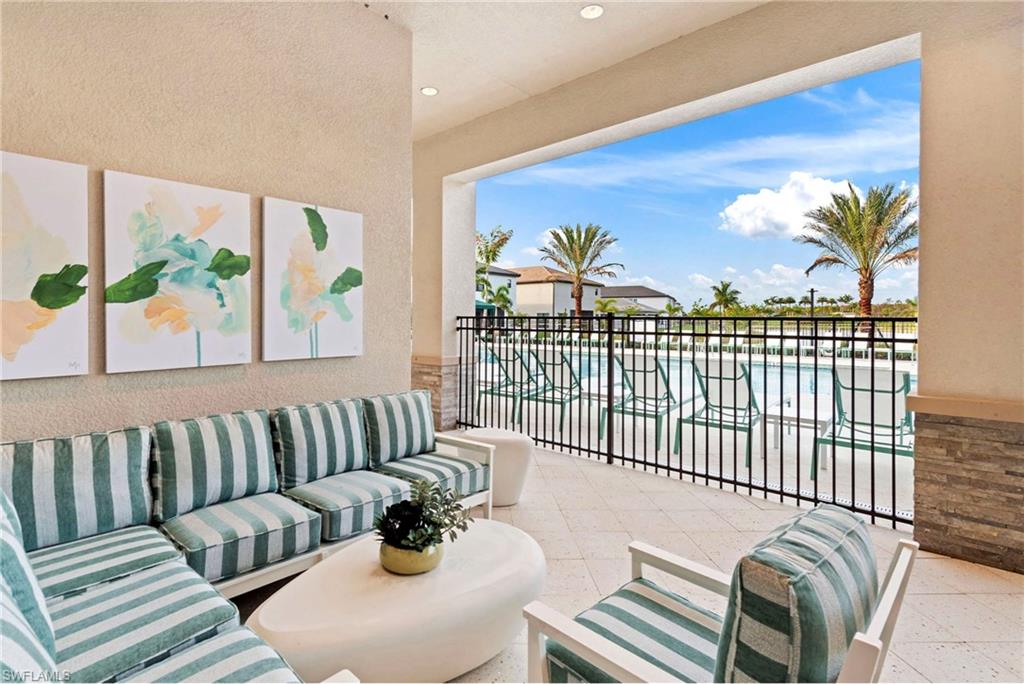 12777 Springbrook Court Estero, FL 33928 - Photo 22 of 27 a view of a living room and a window with balcony view