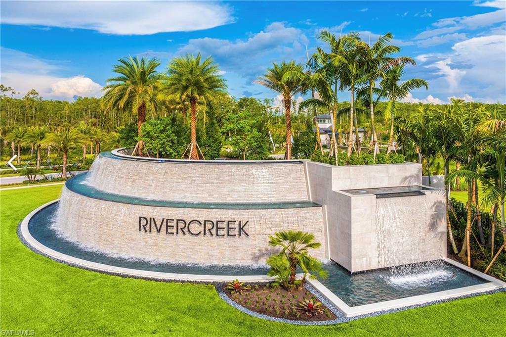 12777 Springbrook Court Estero, FL 33928 - Photo 26 of 27 a view of outdoor space with garden