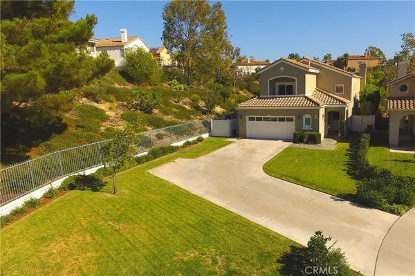 a view of a house with a swimming pool
