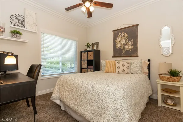 a kitchen with stainless steel appliances granite countertop a sink a stove and a wooden floors