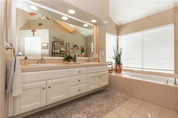 a view of room with window and bathroom
