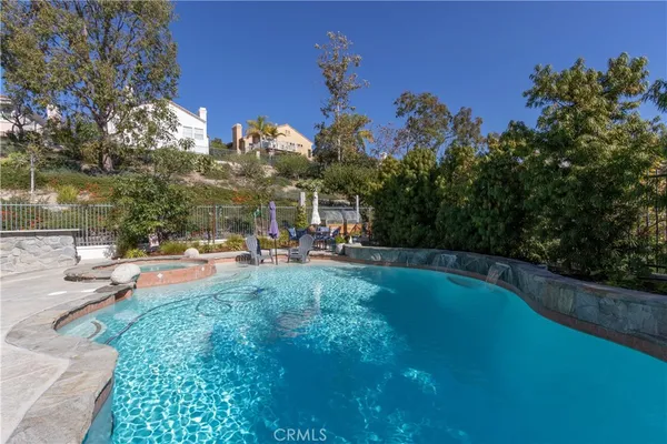 a view of a patio with a table chairs and a table