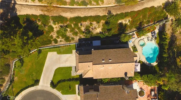 a view of room with window and wooden floor