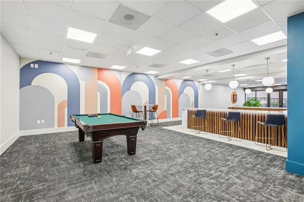 a living room with lots of furniture