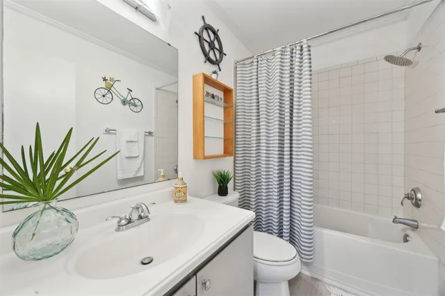 a view of sign board with flower around