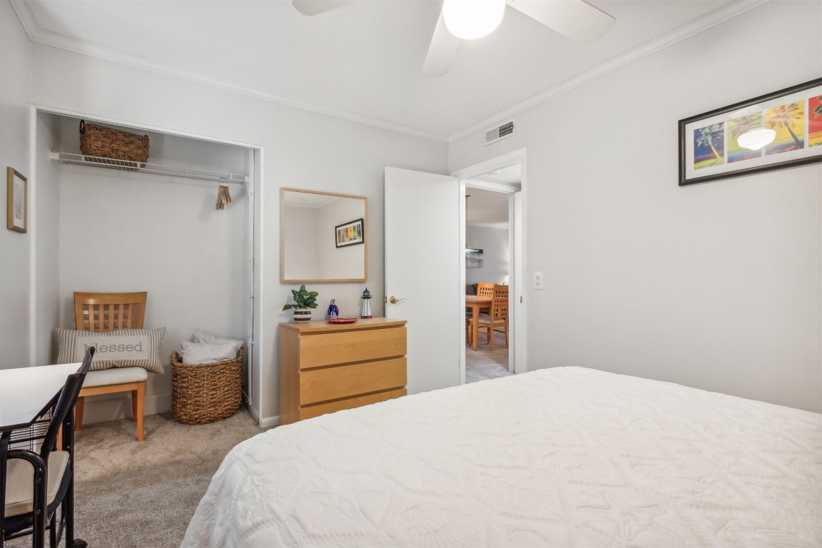 2328 Sadler Road, Unit 8F Fernandina Beach, FL 32034 - Photo 15 of 32 a bedroom with a bed and a table