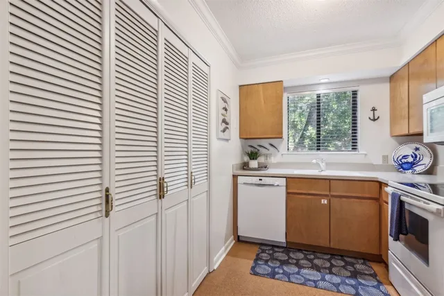 a bedroom with a bed and a table