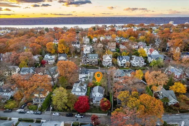 a picture of a bench in front of a wall