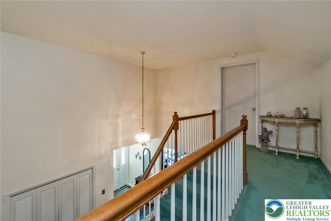 525 Wedgewood Road Bethlehem, PA 18017 - Photo 37 of 61 Ascend to a tranquil upper level overlooking entry foyer with classic wooden banisters.