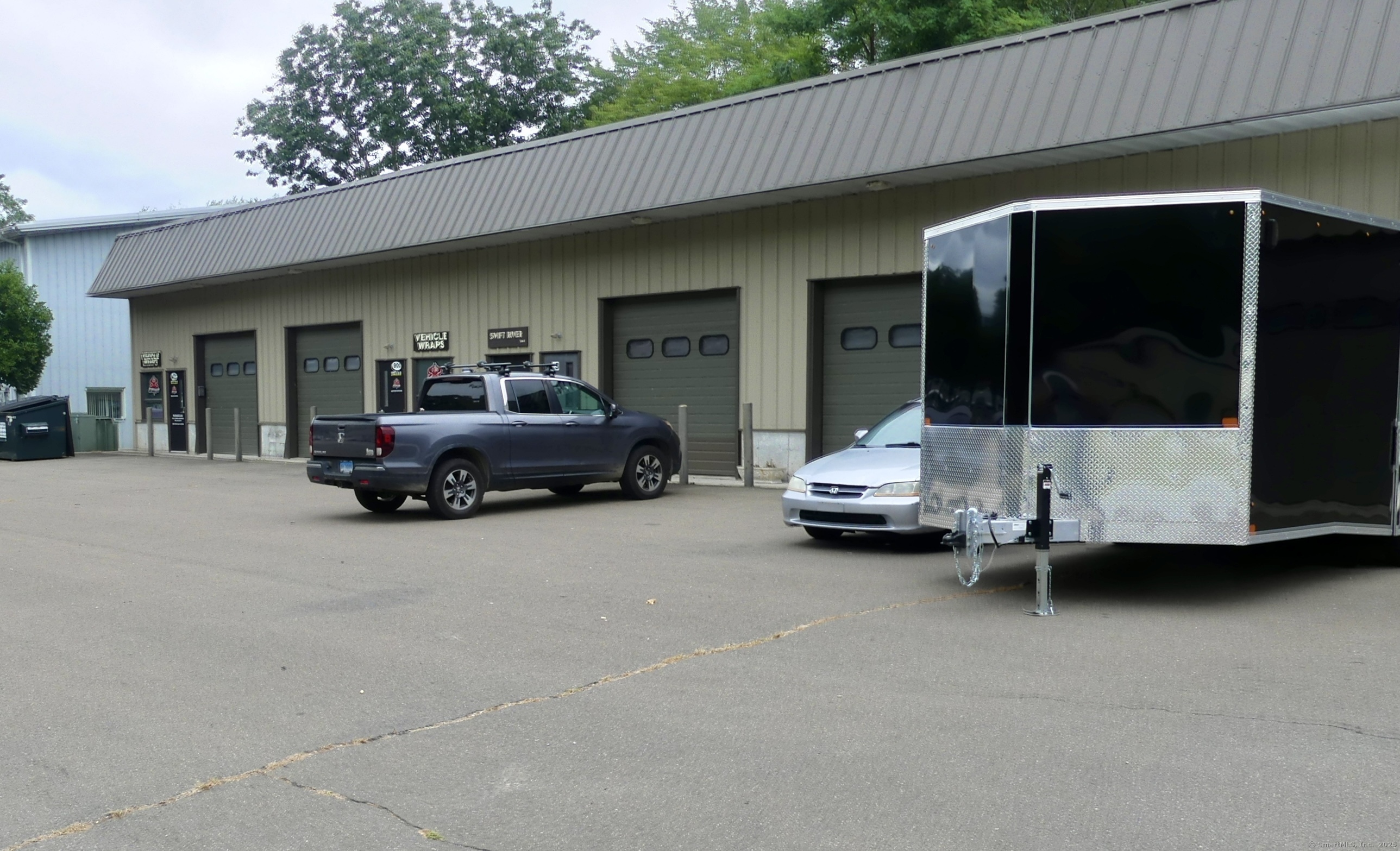 900 Industrial Park Road, Unit 5 Deep River, CT 06417 - Photo 1 of 1 a car parked in front of house