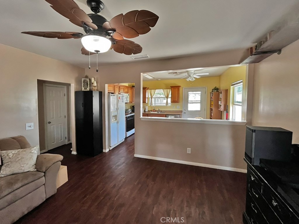 1205 Opal Way Mentone, CA 92359 - Photo 6 of 17 a view of kitchen with furniture and stainless steel appliances