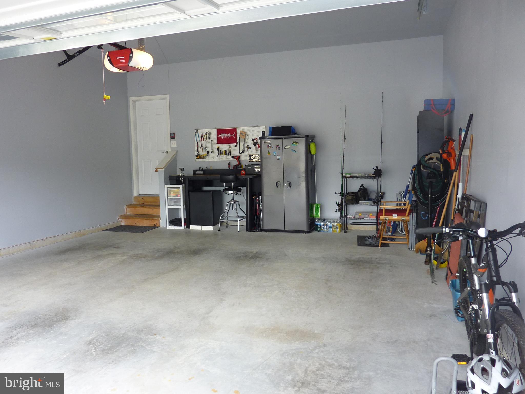 721 Cherry Tree Road Middletown, DE 19709 - Photo 32 of 39 Garage - Work Station & Cabinet Included
