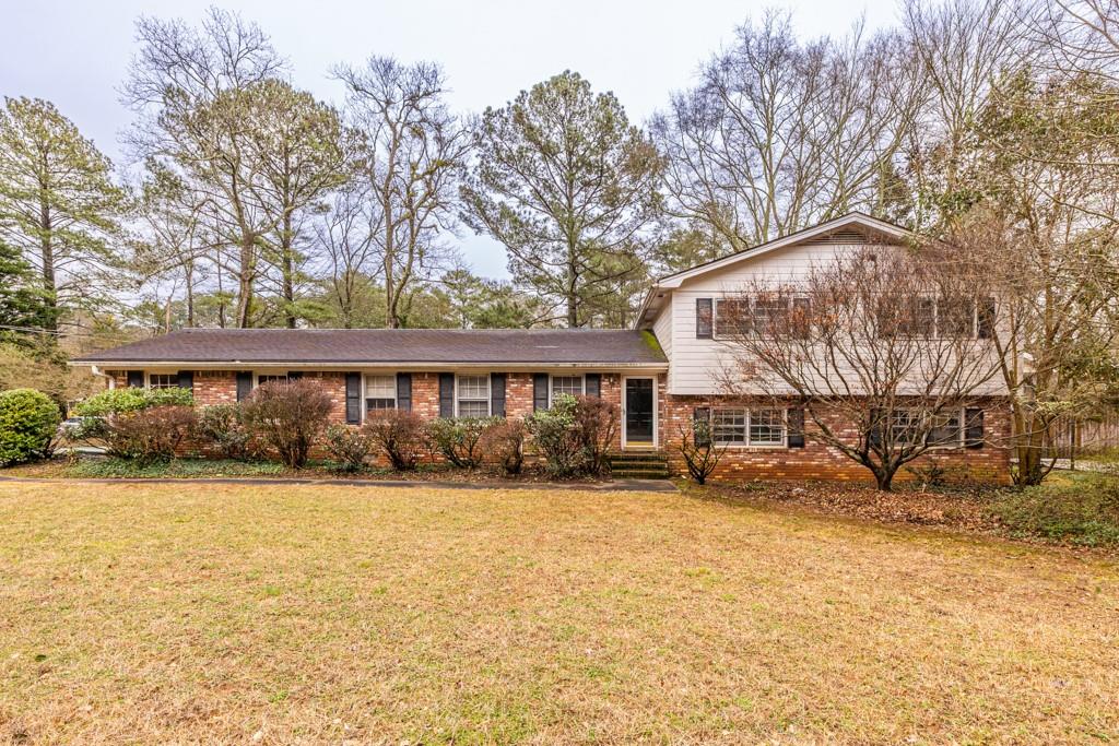 2739 Millwood Court Decatur, GA 30033 - Photo 1 of 1 a view of a house with a yard covered in snow