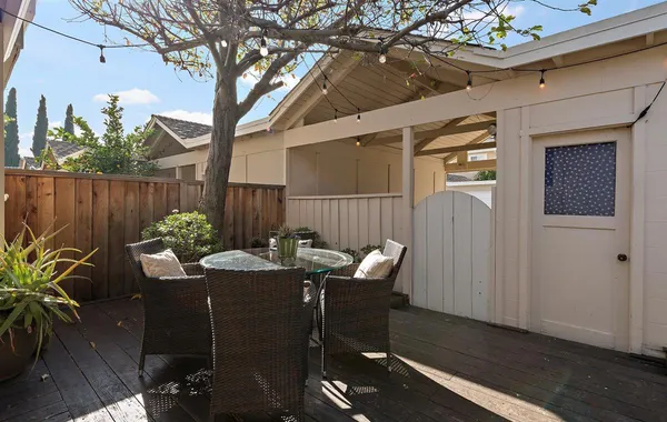 a view of a table and chairs in patio
