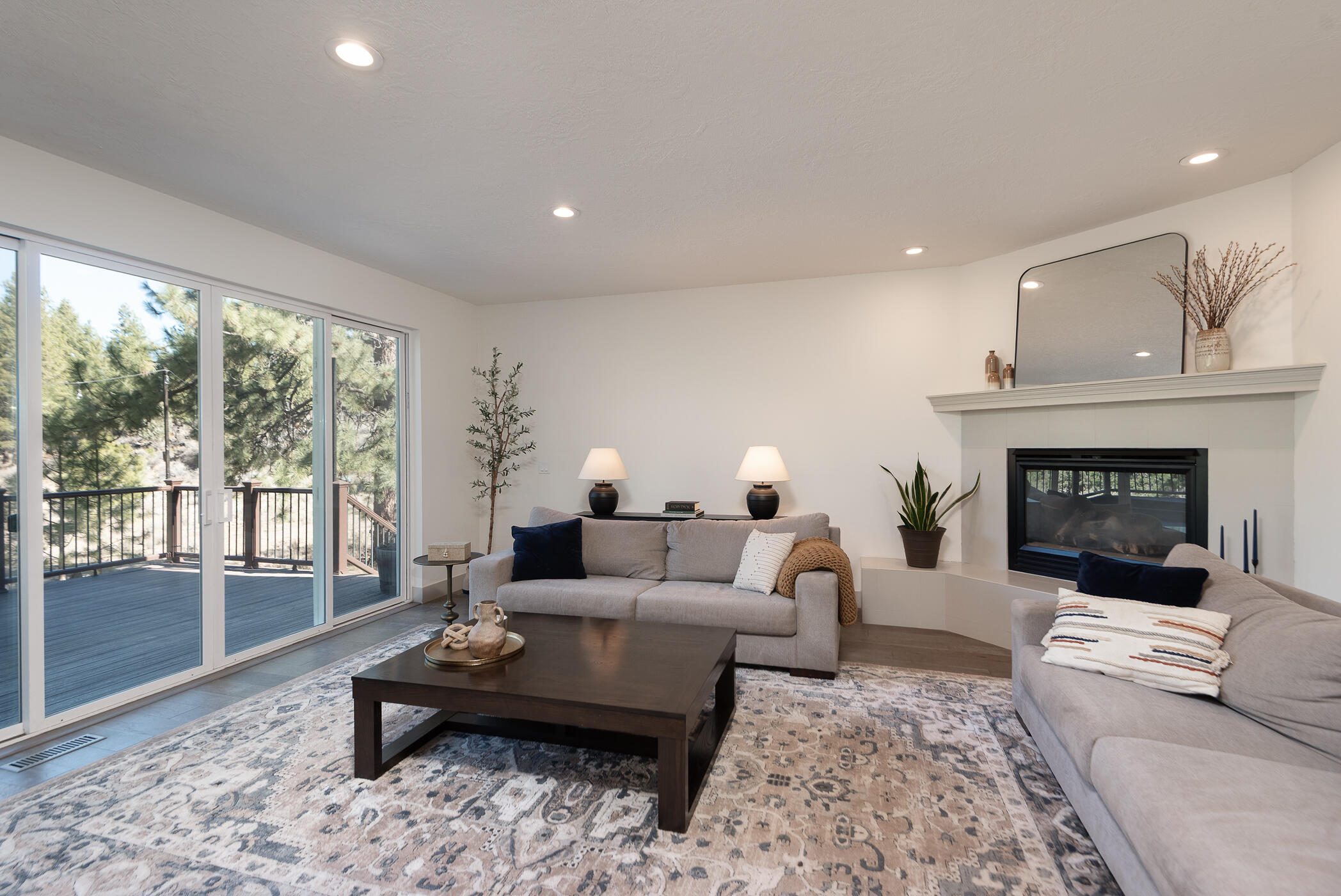 60012 West Ridgeview Drive Bend, OR 97702 - Photo 2 of 55 a living room with furniture and a fireplace
