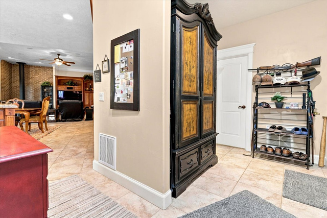 11290 South Southfield Road Mayfield, UT 84643 - Photo 56 of 103 Neutral tone wall, recessed lighting, and tile flooring