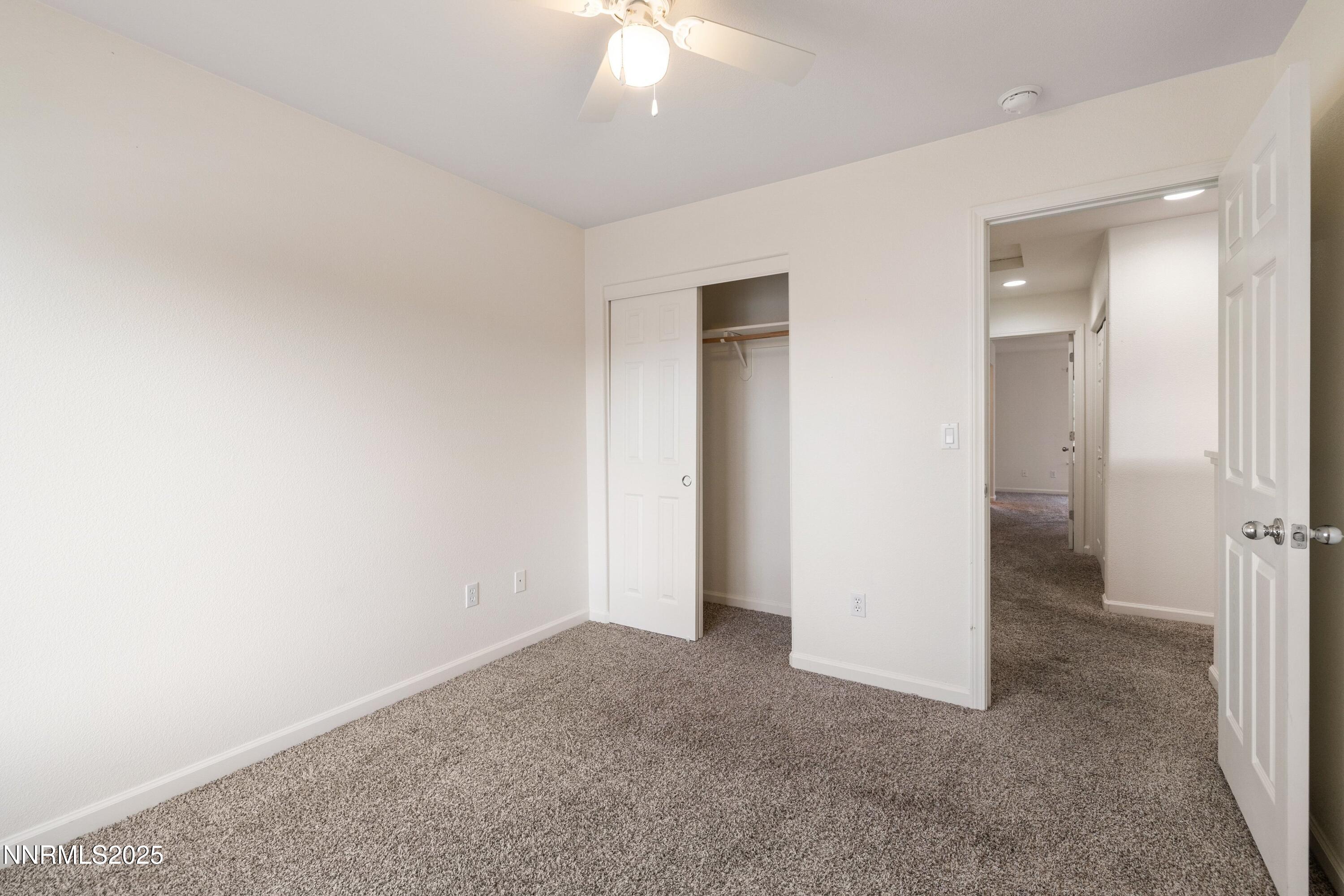 9294 Lone Wolf Circle Reno, NV 89506 - Photo 17 of 25 an empty room with a bathroom