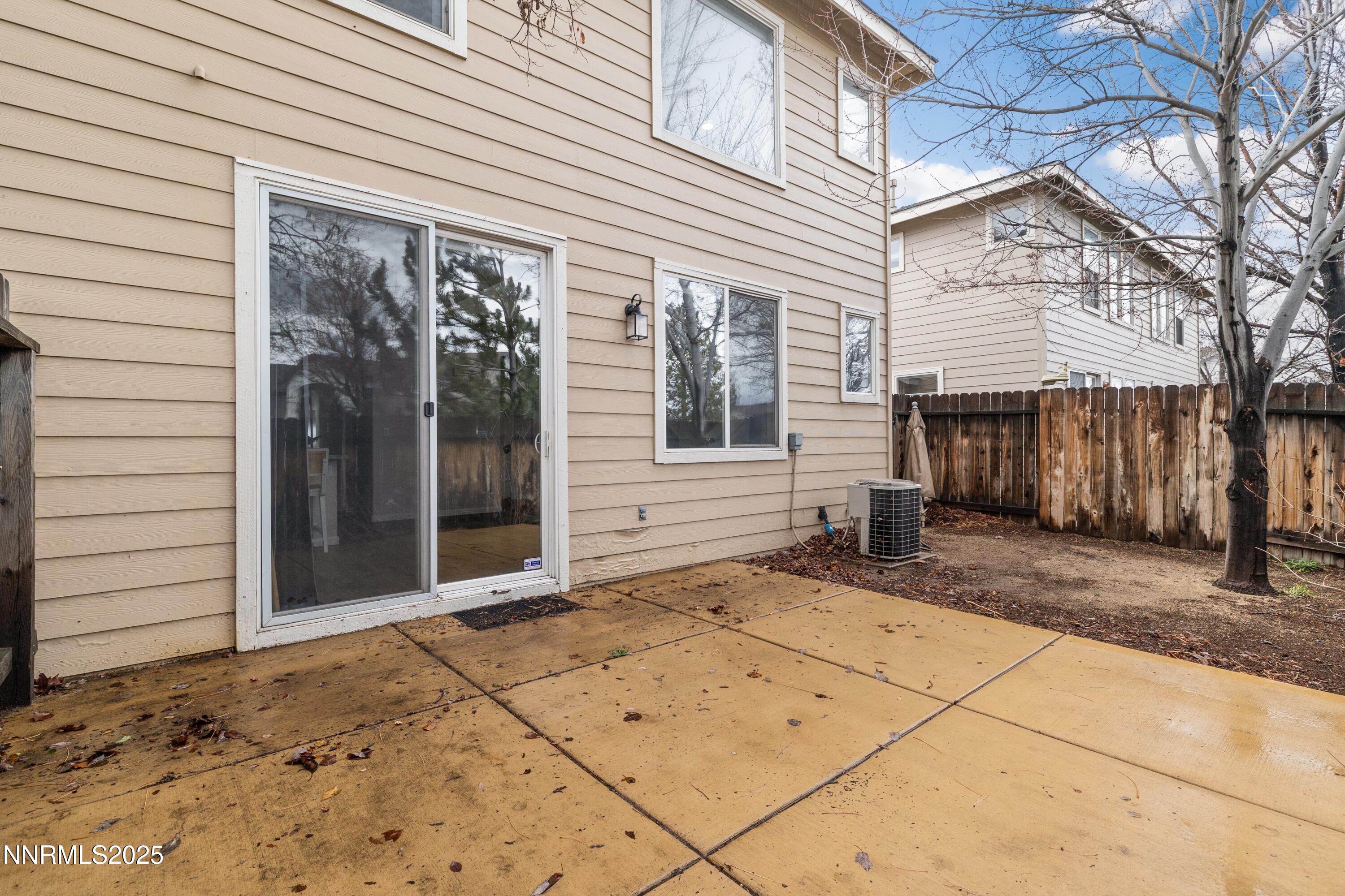 9294 Lone Wolf Circle Reno, NV 89506 - Photo 24 of 25 a view of a entrance door of the house