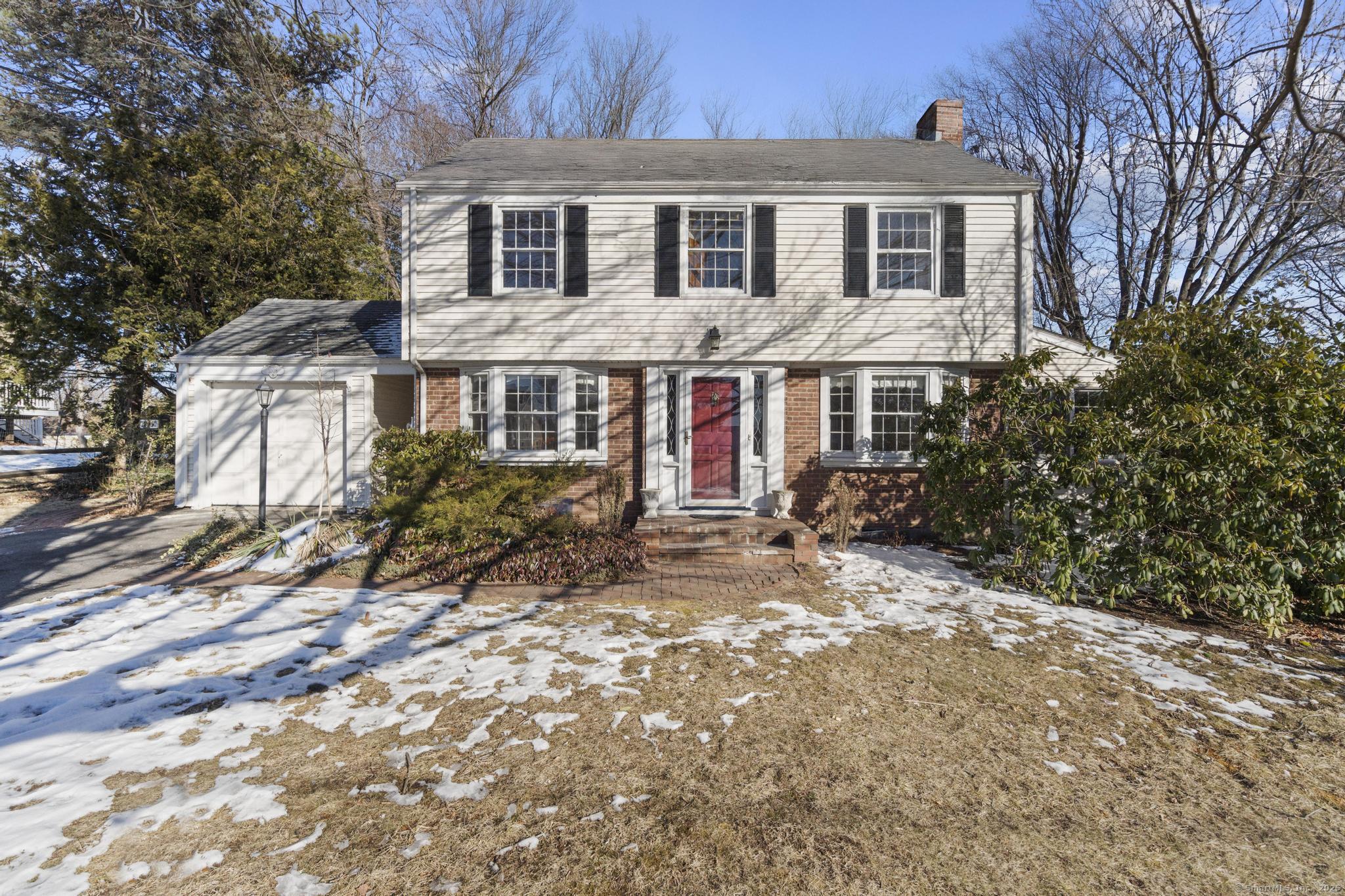 1008 Ridge Road Wethersfield, CT 06109 - Photo 1 of 1 a view of a house with a yard
