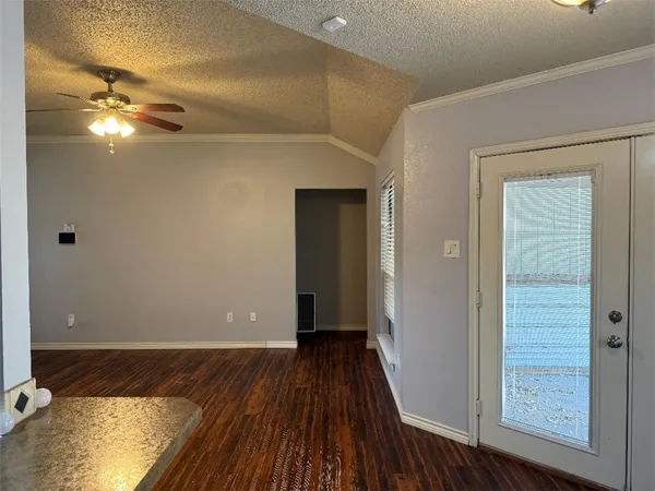 wooden floor in an empty room with a mirror