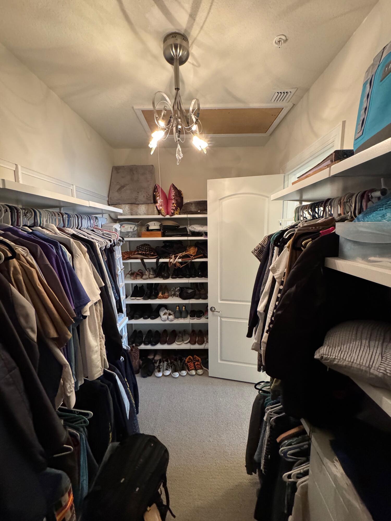 21872 Canadensis Circle, Unit 202 Boca Raton, FL 33428 - Photo 39 of 43 inside walkin closet